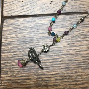 Bird charm necklace